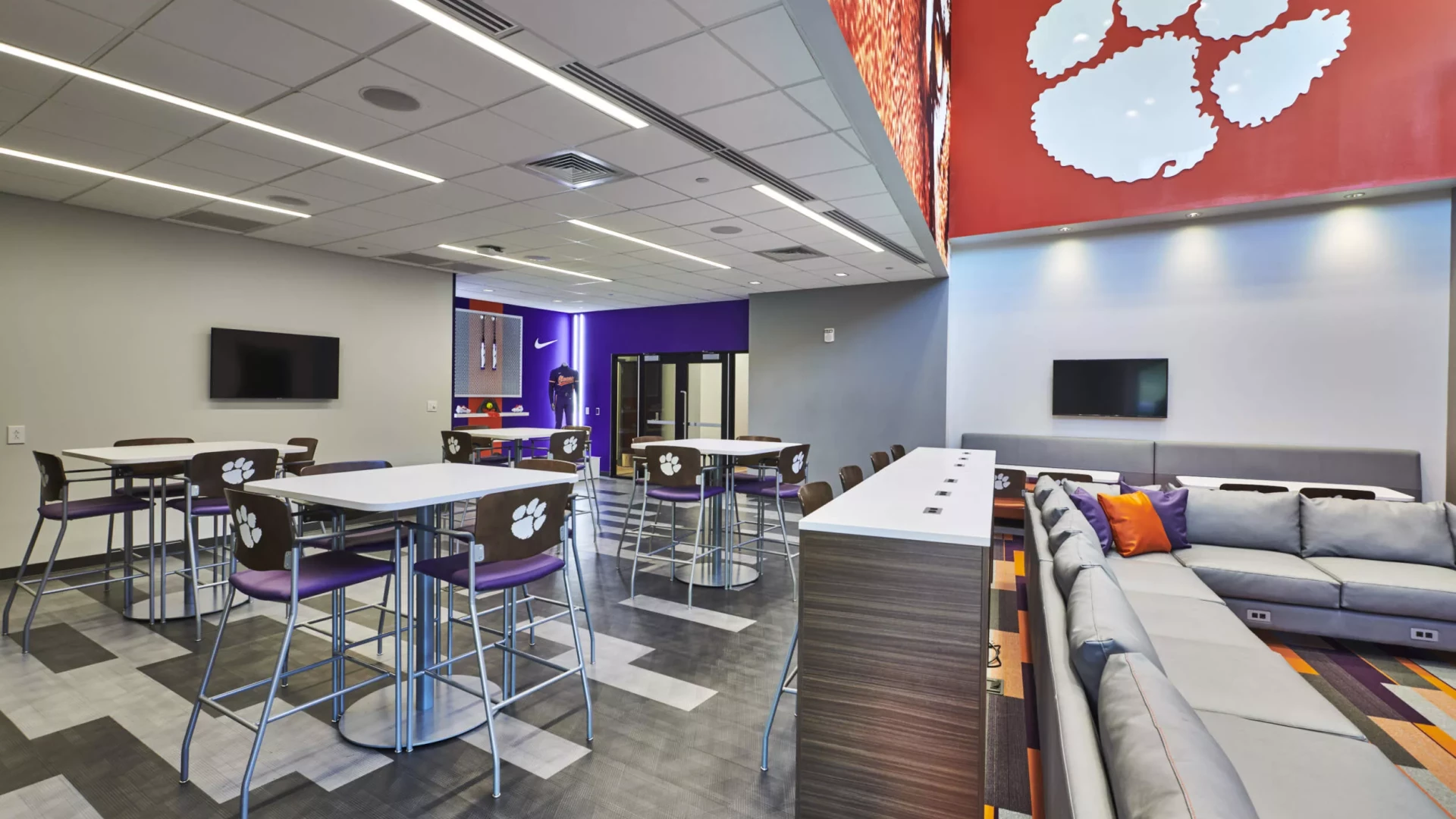 Softball lounge with gear display.