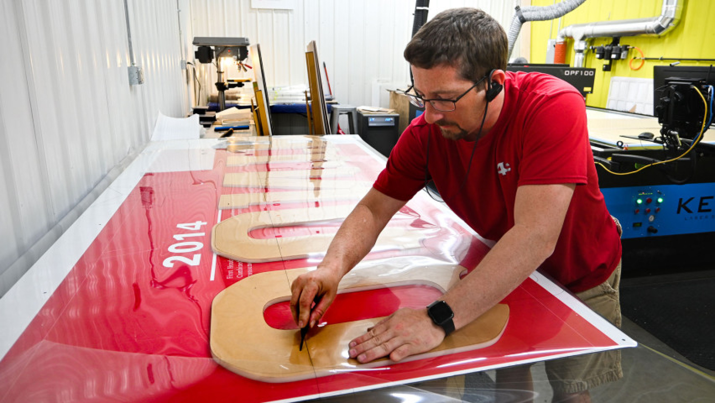 man working on a sign
