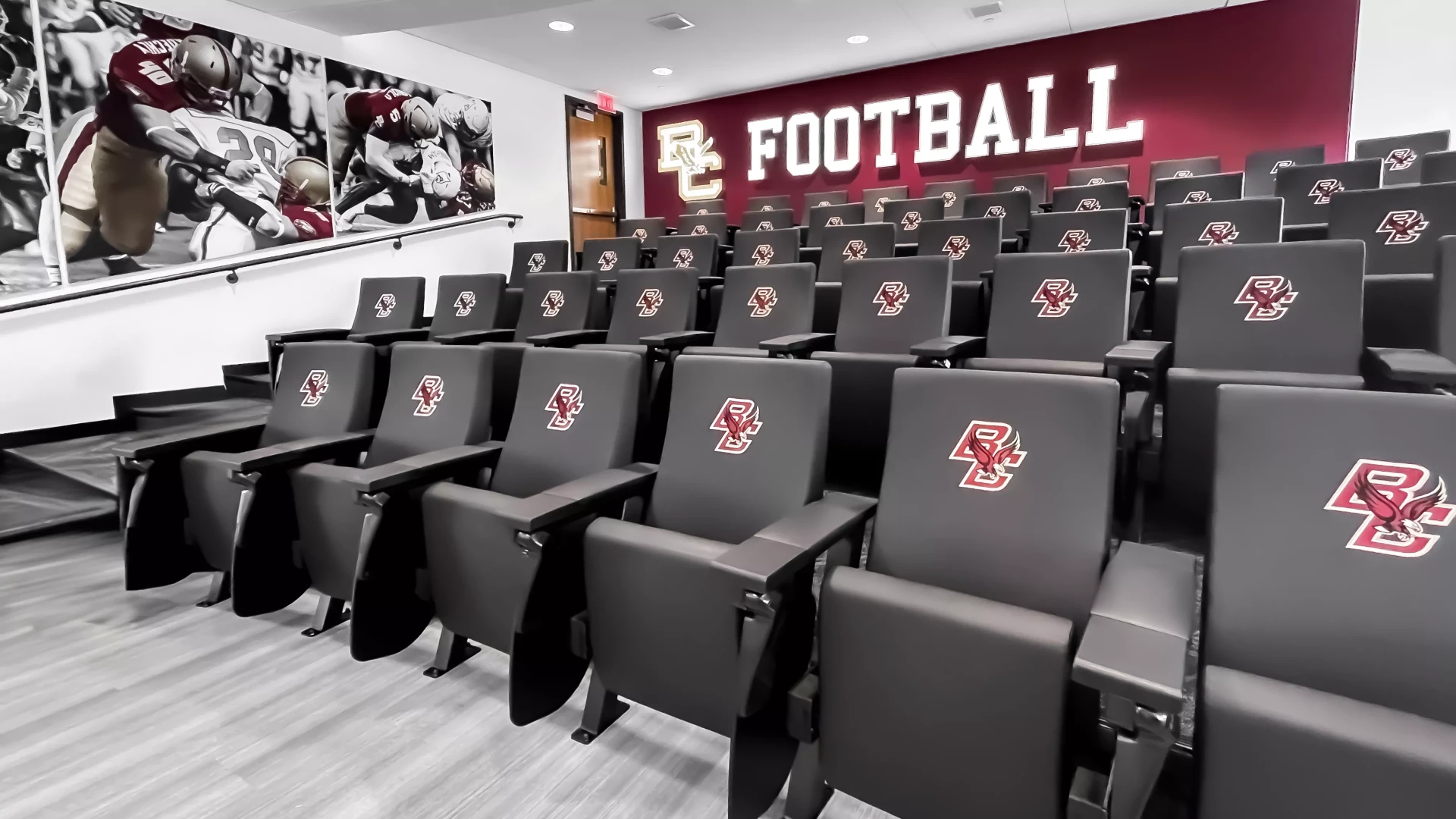 Team room with illuminated logos and wall graphics.