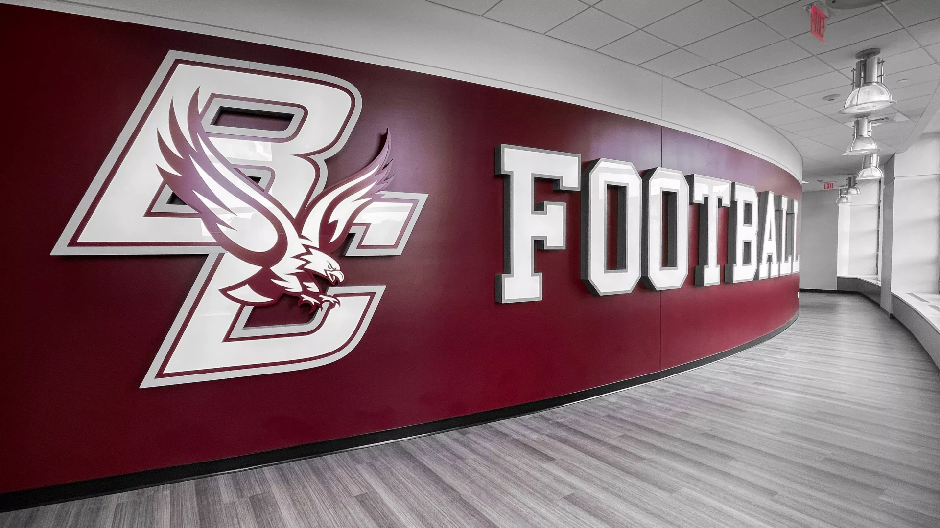 Football hallway with dimensional lettering and a dimensional logo.